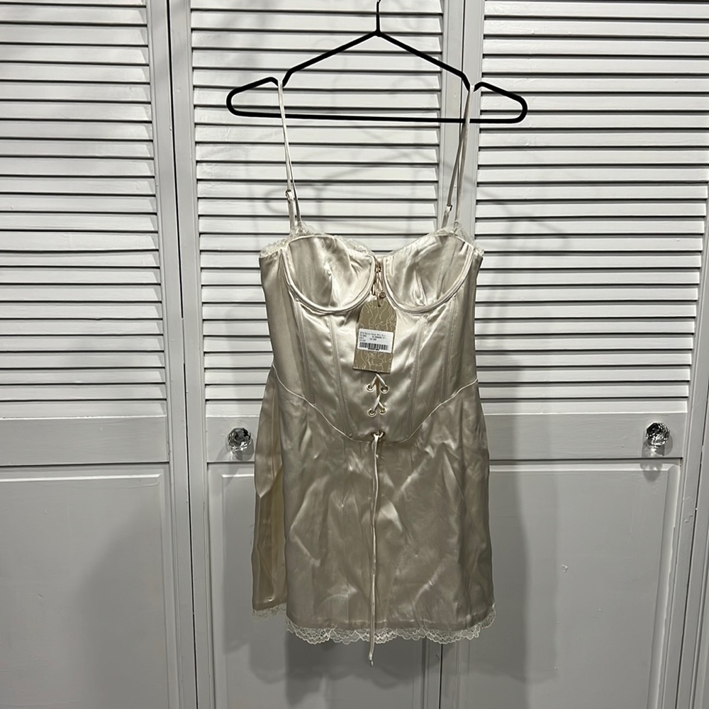 Ivory coloured Meshki corset mini dress never used